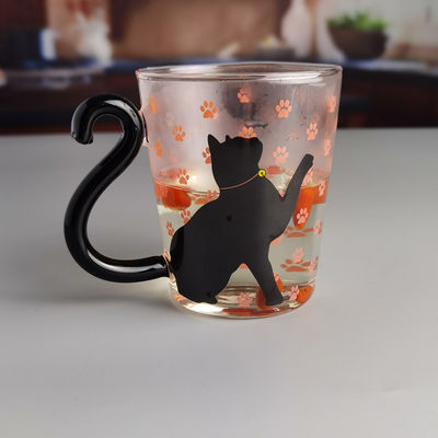 kwaliteit Borosilicaat Black Cat Tea Glass Mug met kleurrijke staartgreep fabriek