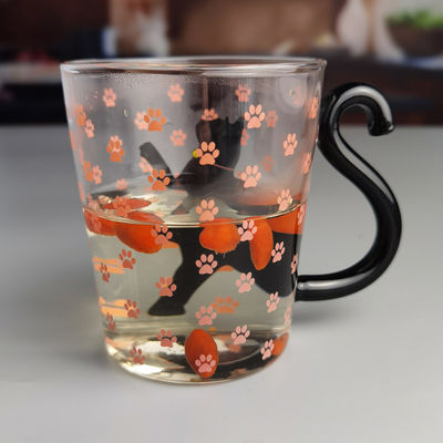 kwaliteit Borosilicaat Black Cat Tea Glass Mug met kleurrijke staartgreep fabriek